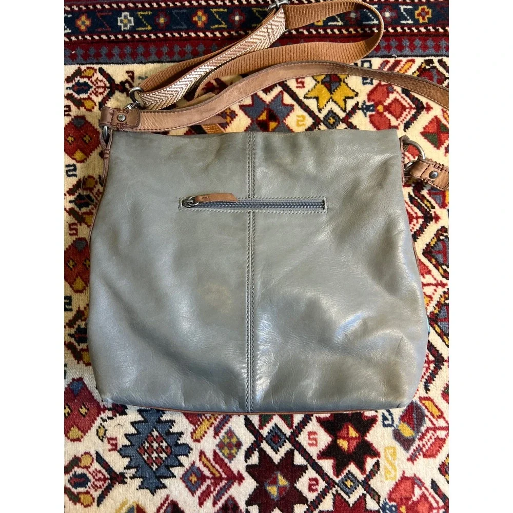 The Sak Slate Gray Leather Hobo Crossbody Bag with Chevron Guitar Strap
